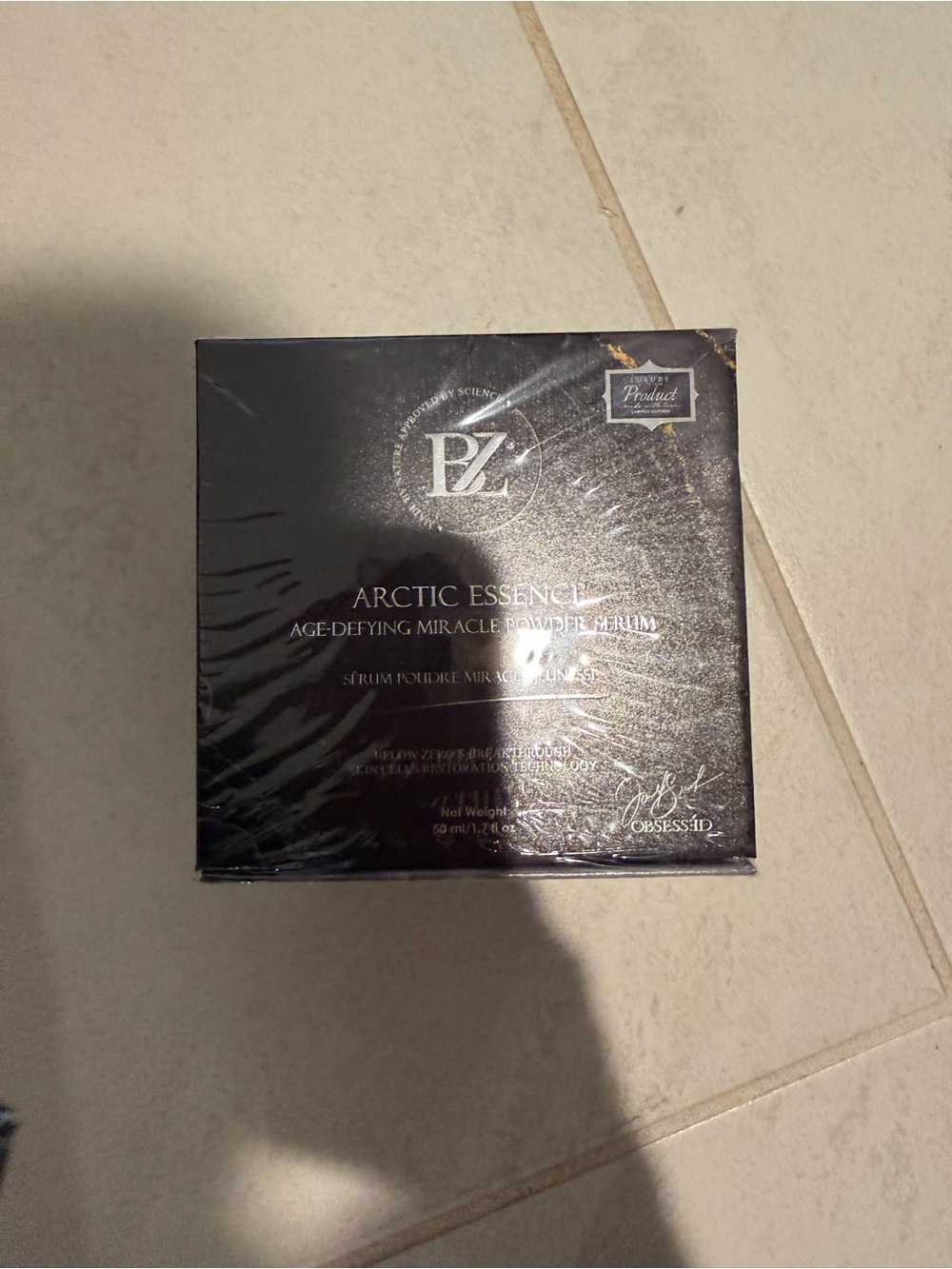 PZ Arctic Essence Age-Defying Miracle Powder Serum - Black Packaging